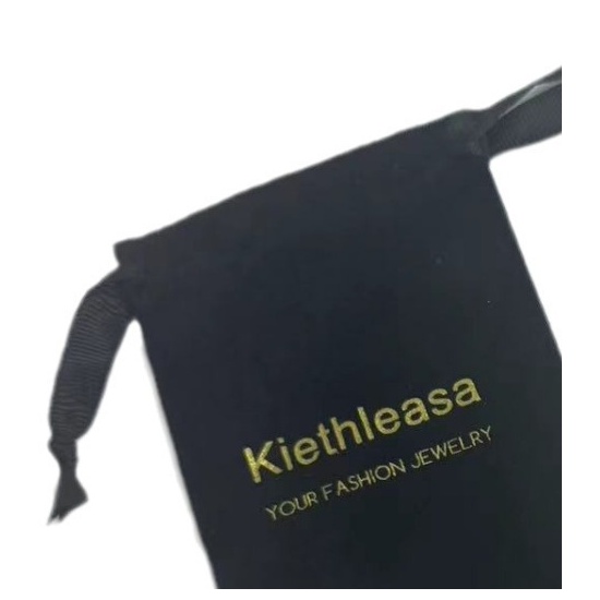 Midnight Black velvet pouch with gold foil branding